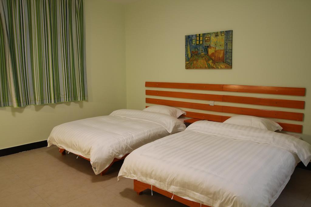 Tiffany Hostel Янгшуо Стая снимка